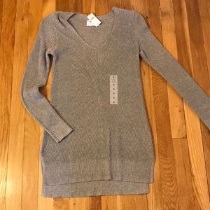 Long knitted V-neck sweater